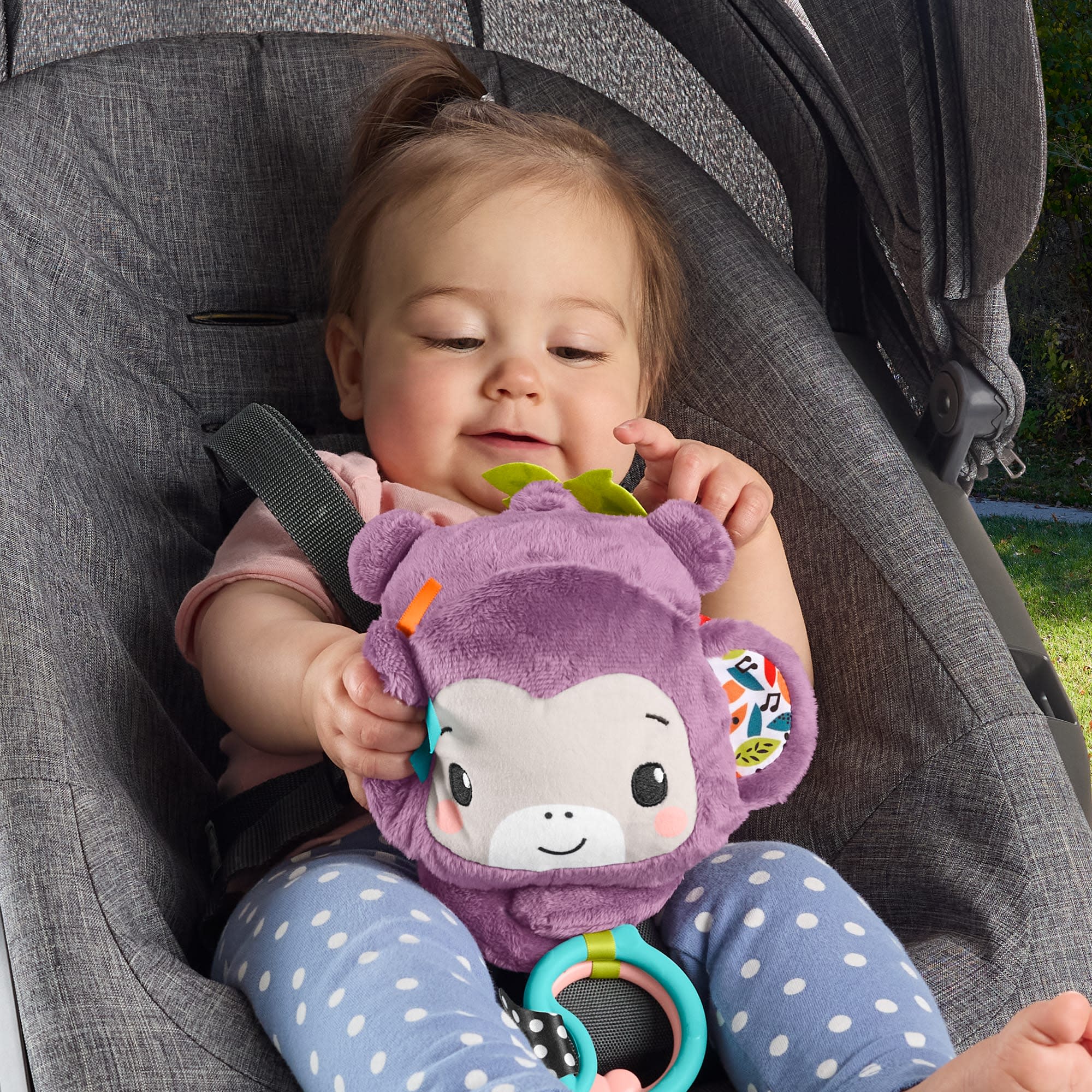 Fisher-Price Sing & Go Purple Monkey Plush Baby Stroller Sensory Toy for Newborns - Image 5